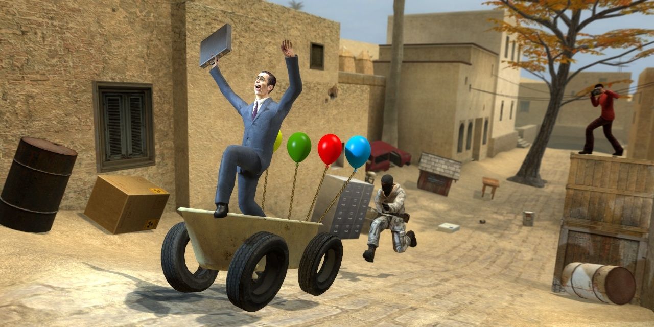 G-Man riding a tub on wheels with balloons in Garry's Mod