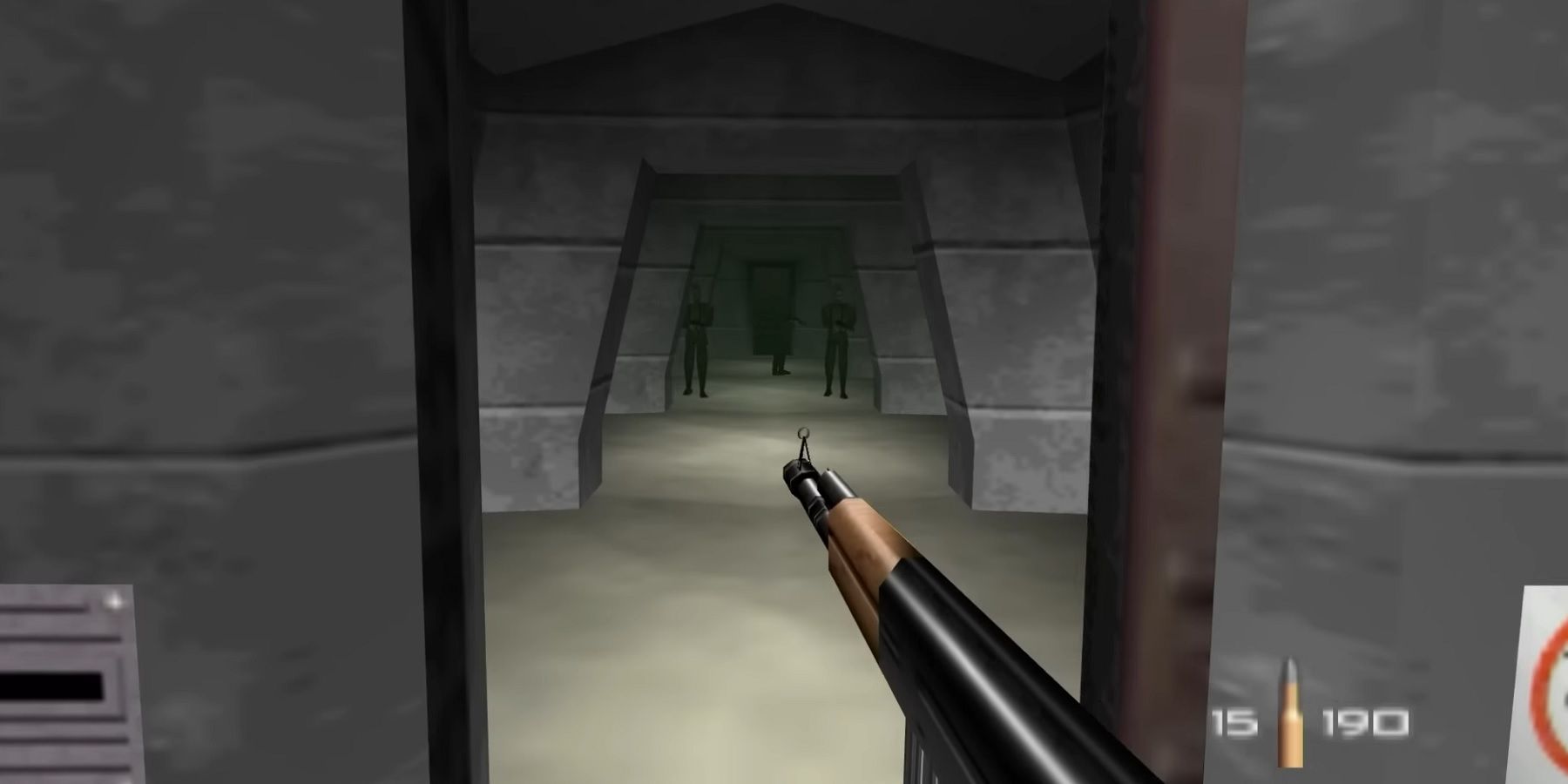 Image from Goldeneye 007 showing James Bond about to fire down a corridor filled with enemies.
