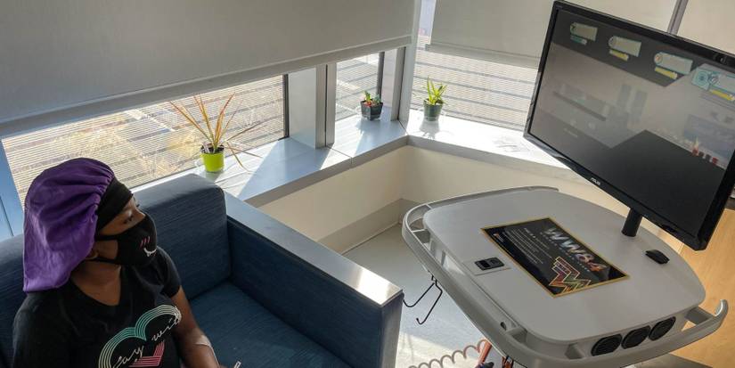 Hospital patient playing on a Gamers Outreach GO-Kart