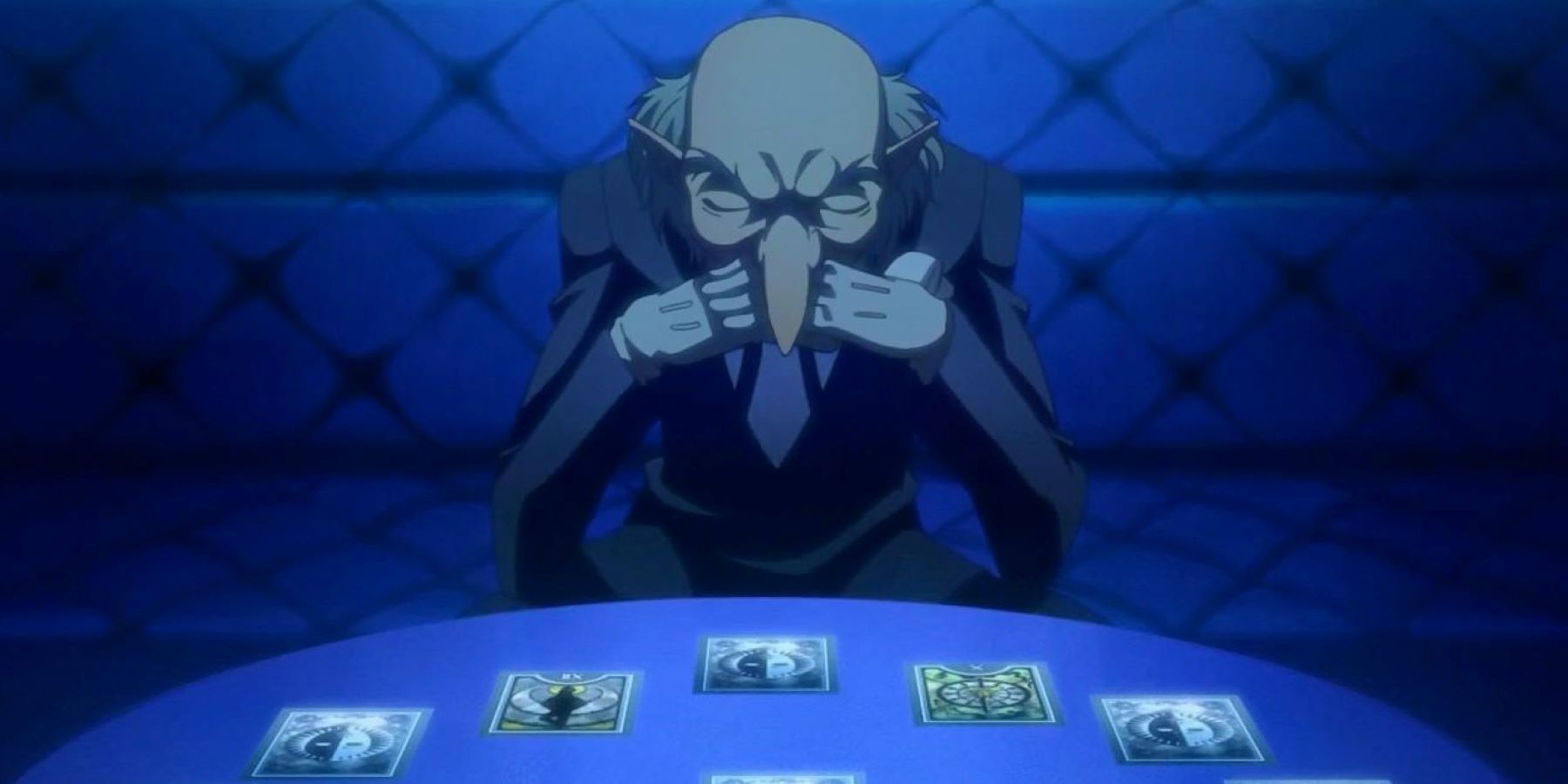 Igor looking at tarot cards in the Velvet Room in a Persona cutscene