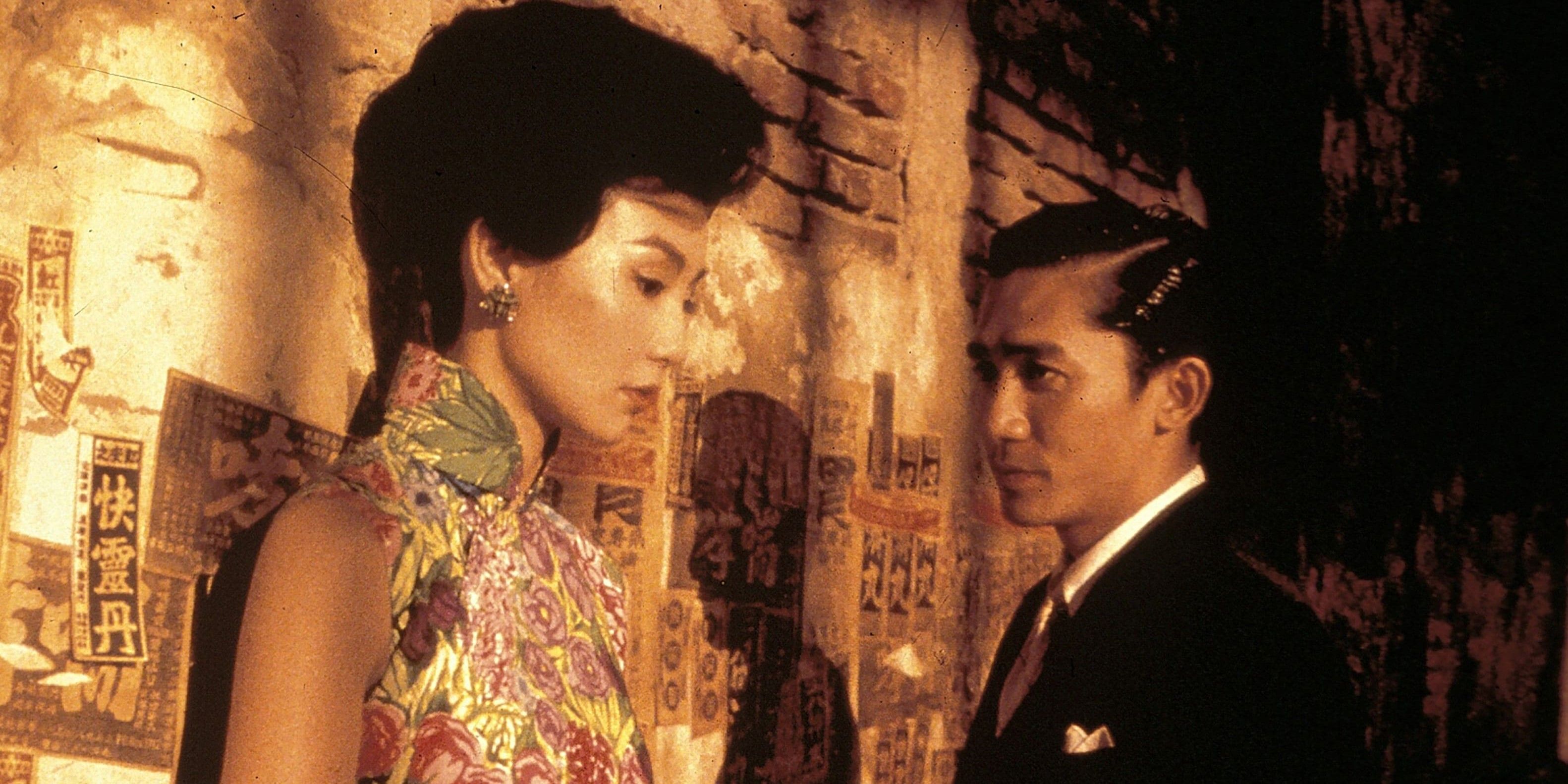 Tony Chiu-Wai Leung stares at Maggie Cheung in In The Mood For Love (2000).