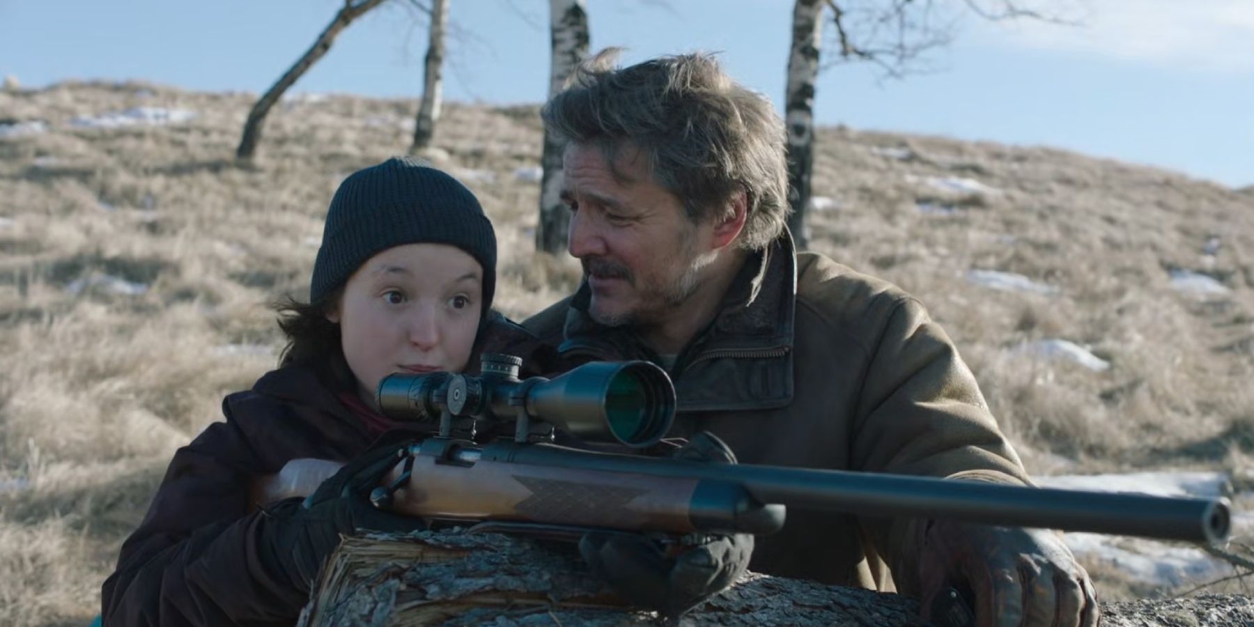 The Last of Us Bella Ramsey as Ellie and Pedro Pascal as Joel shooting rifle