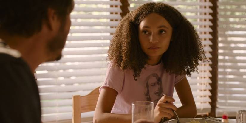 Joel and Sarah Miller having breakfast in The Last of Us.