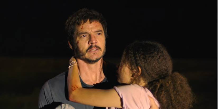 Joel carrying Sarah in The Last of Us.