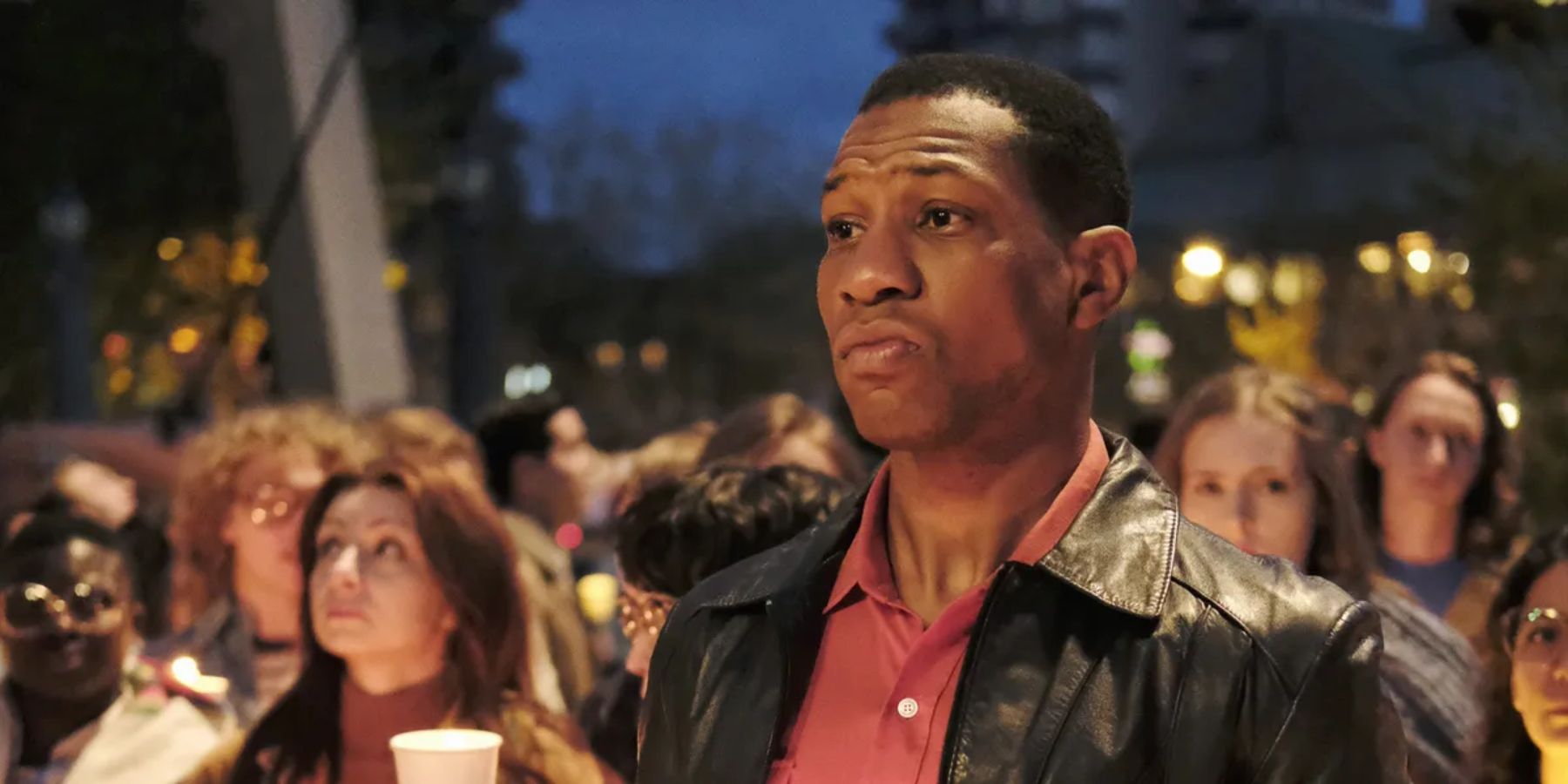 Jonathan Majors in When We Rise standing in a crowd