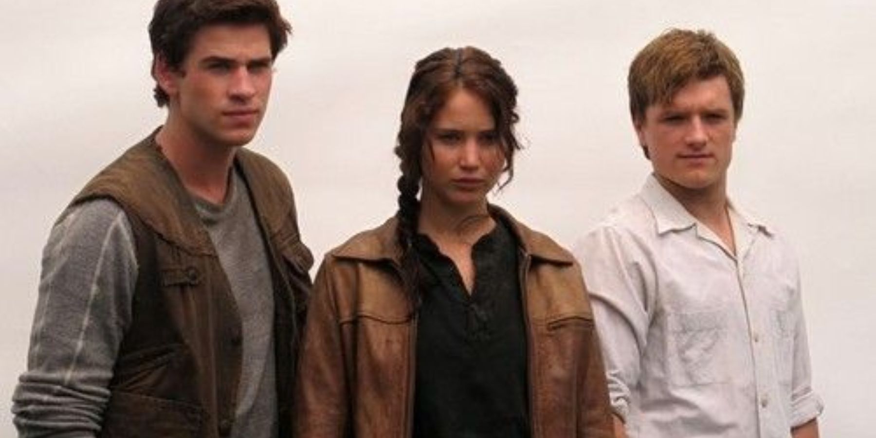 Gale (Liam Hemsworth), Katniss (Jennifer Lawrence) and Peeta (Josh Hutcherson) in The Hunger Games