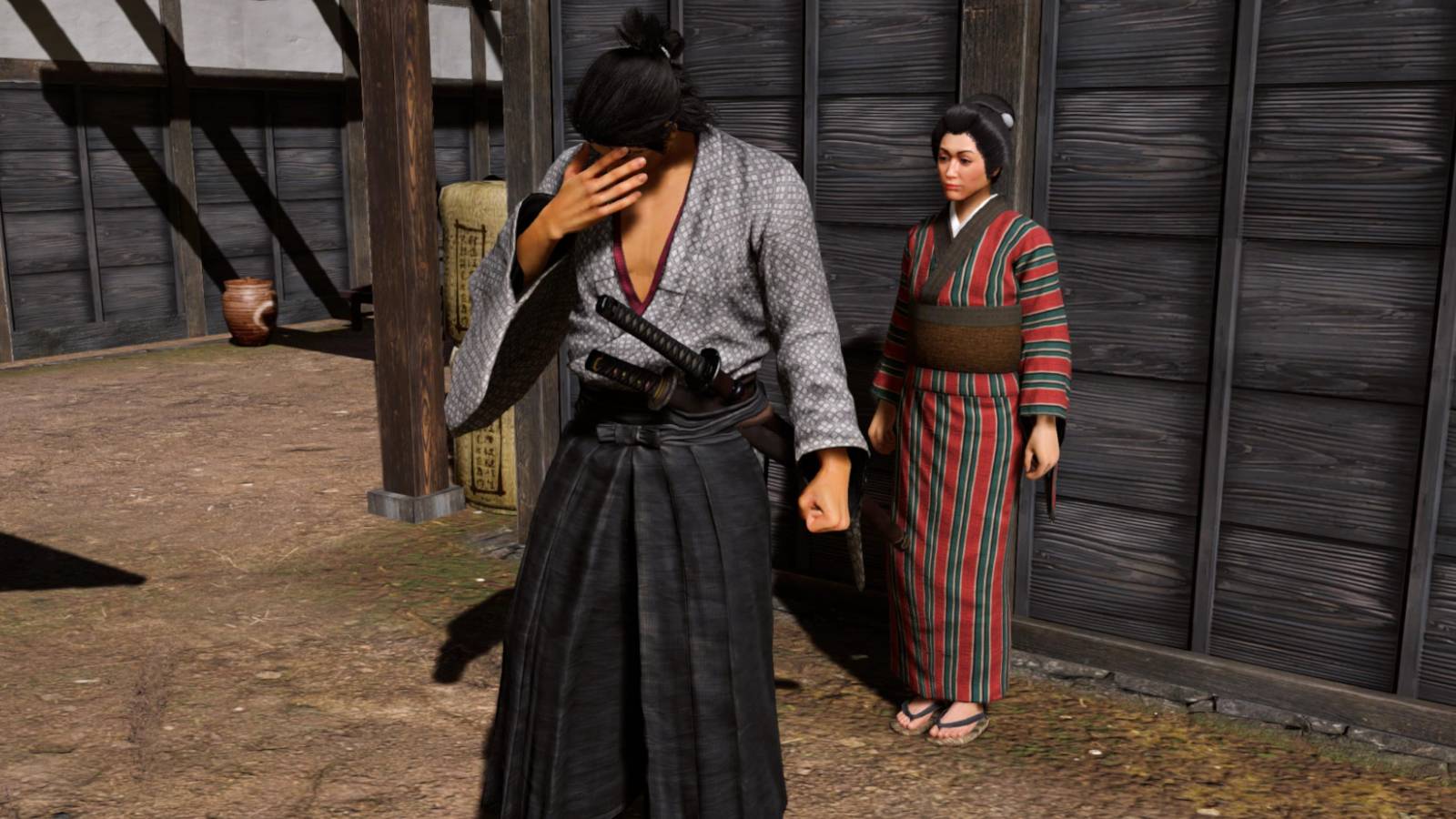 Like a Dragon Isin - a depressed looking Ryomo with Sakiko