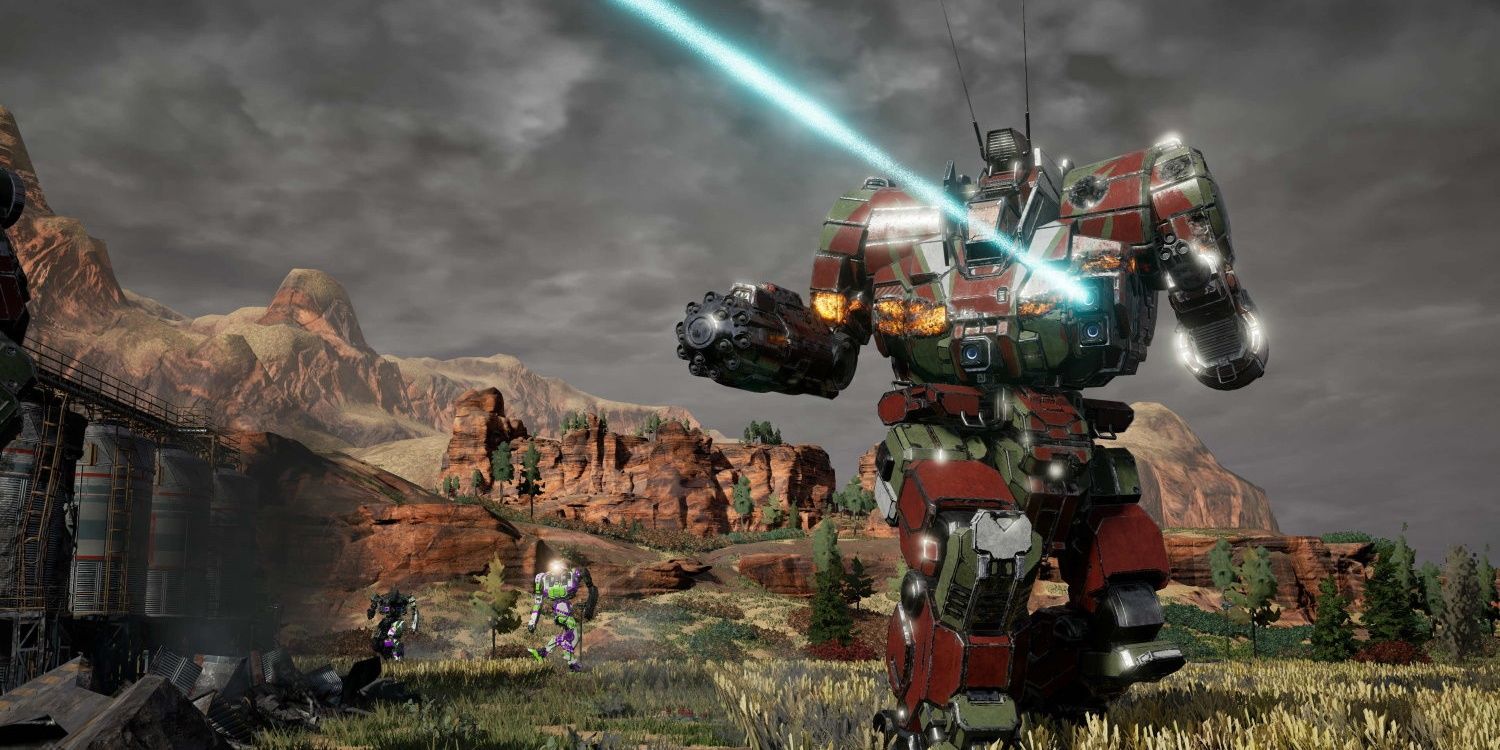 mechwarrior 5 player getting shot at by a laser with two media mechs in the background 