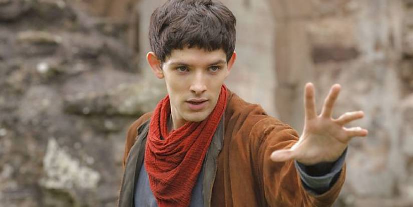 The titular Merlin with one hand raised, preparing to cast a spell.