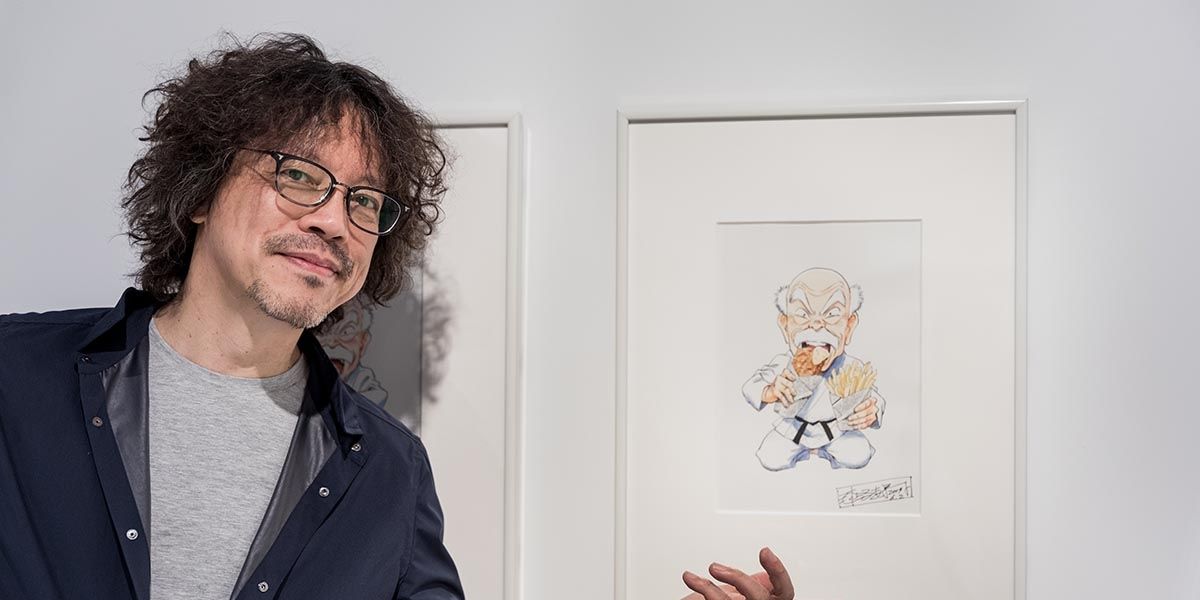 Naoki Urasawa with a piece of art