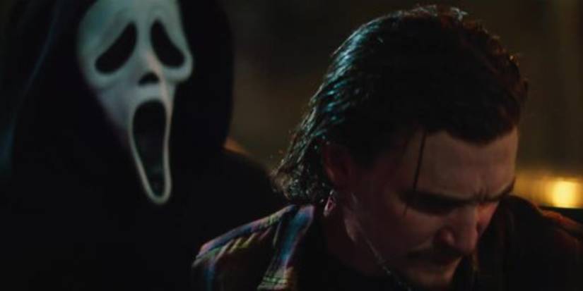 Ghostface standing behind Vince in Scream (2022)