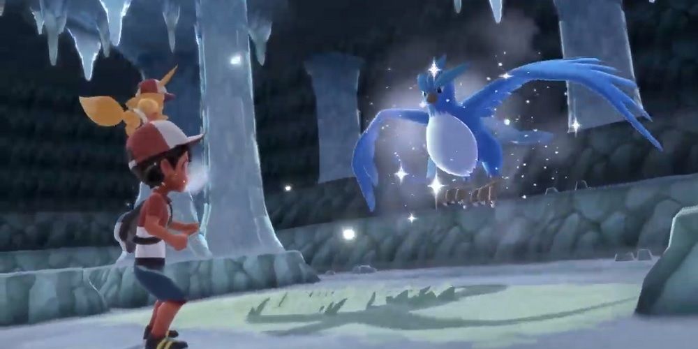The player encountering Articuno in the Seafoam Islands in Pokemon Lets Go Pikachu and Eevee