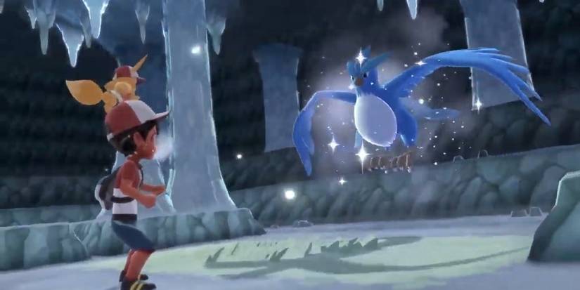 The player encountering Articuno in the Seafoam Islands in Pokemon Lets Go Pikachu and Eevee