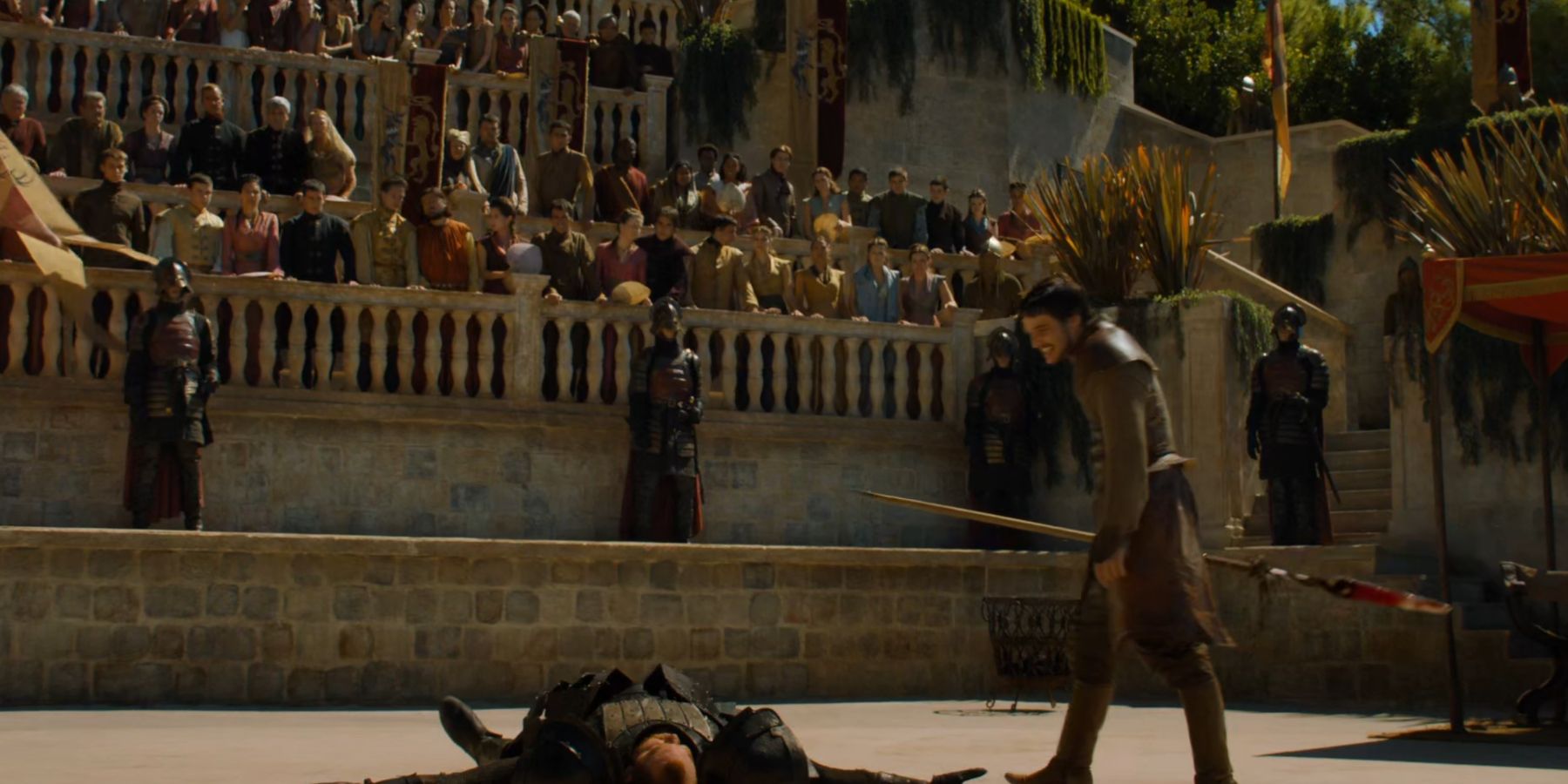Oberyn Martell duels Ser Gregor Clegane in Game of Thrones.