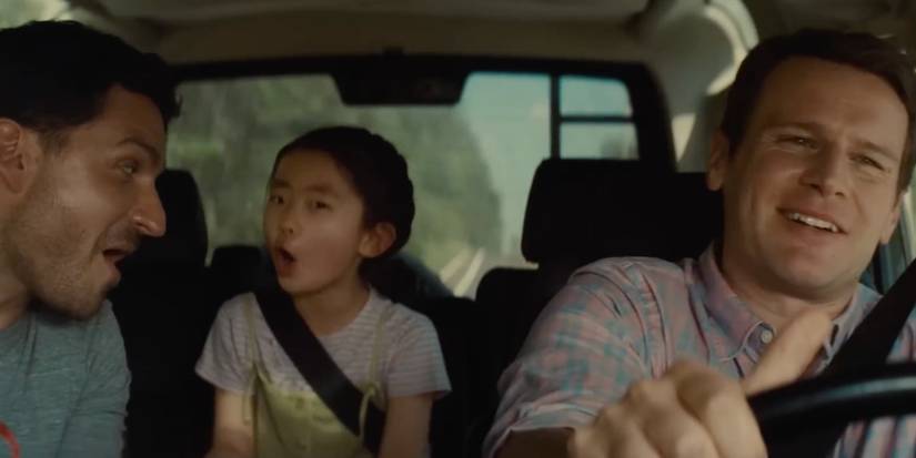 Singing in the car in Knock at the Cabin