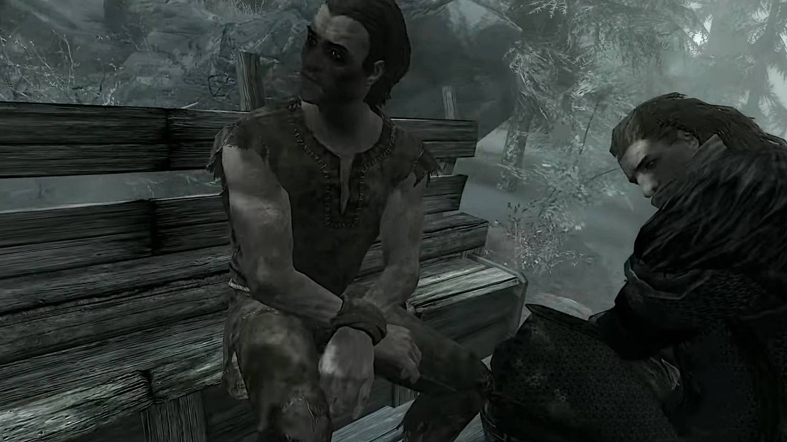 Image from the Skryim intro showing Ulfrich Stormclock and Lokir in the back of the cart.