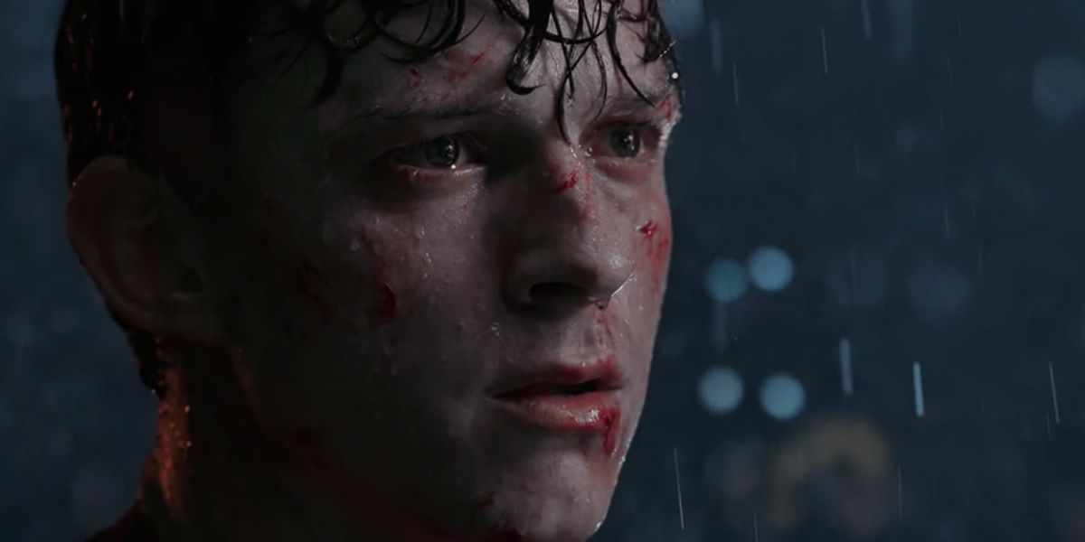 Close up shot of Spider-Man in the rain after Aunt May died