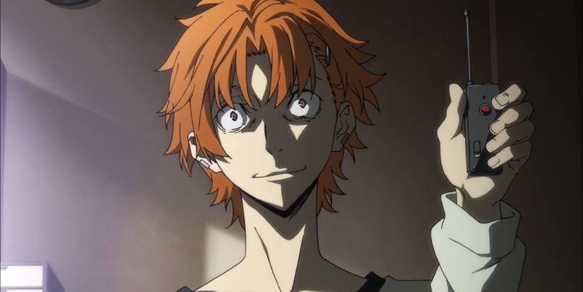 Tanizaki holding a detonator