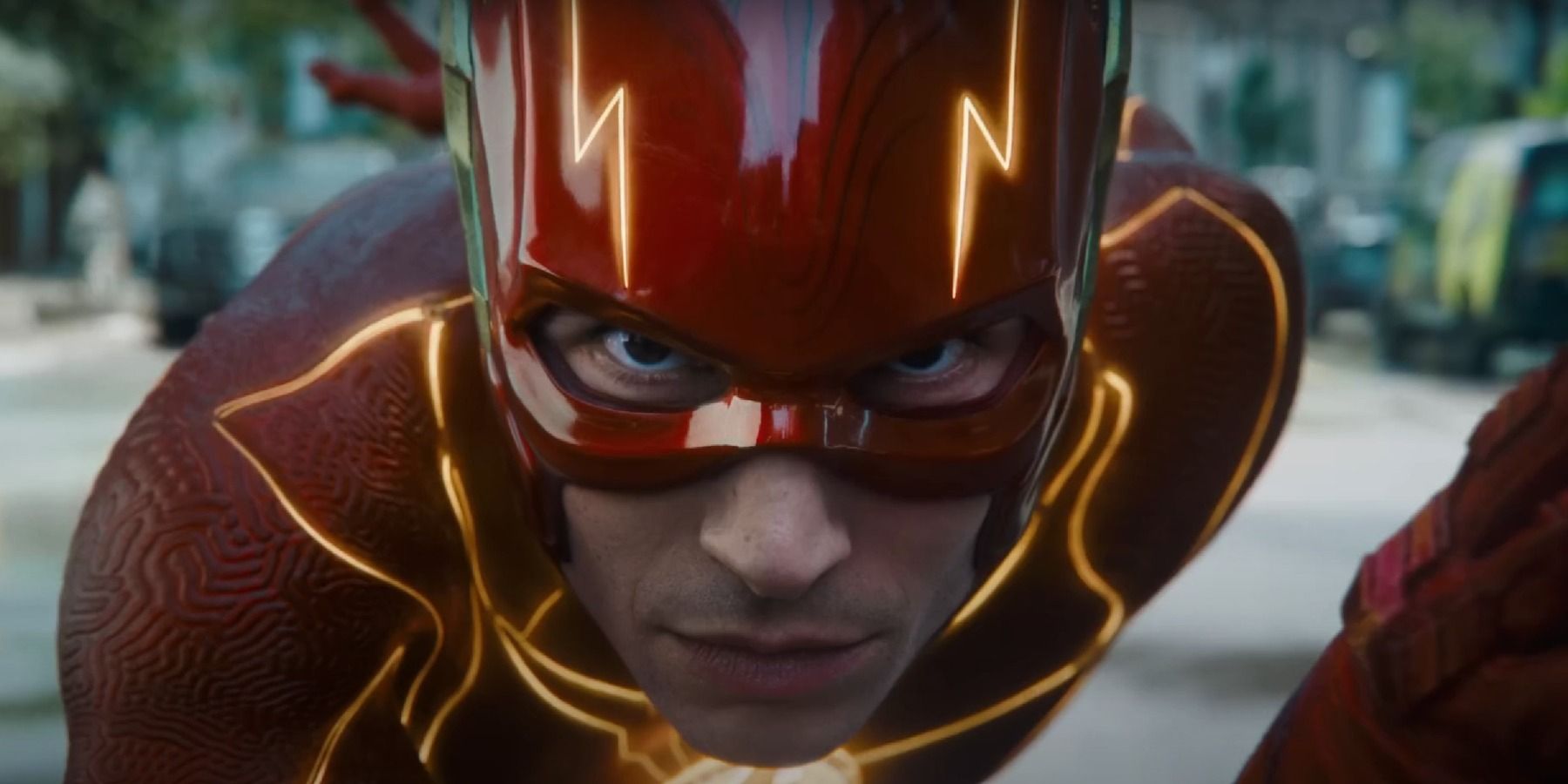 Ezra Miller as Barry Allen in costume close-up in The Flash trailer