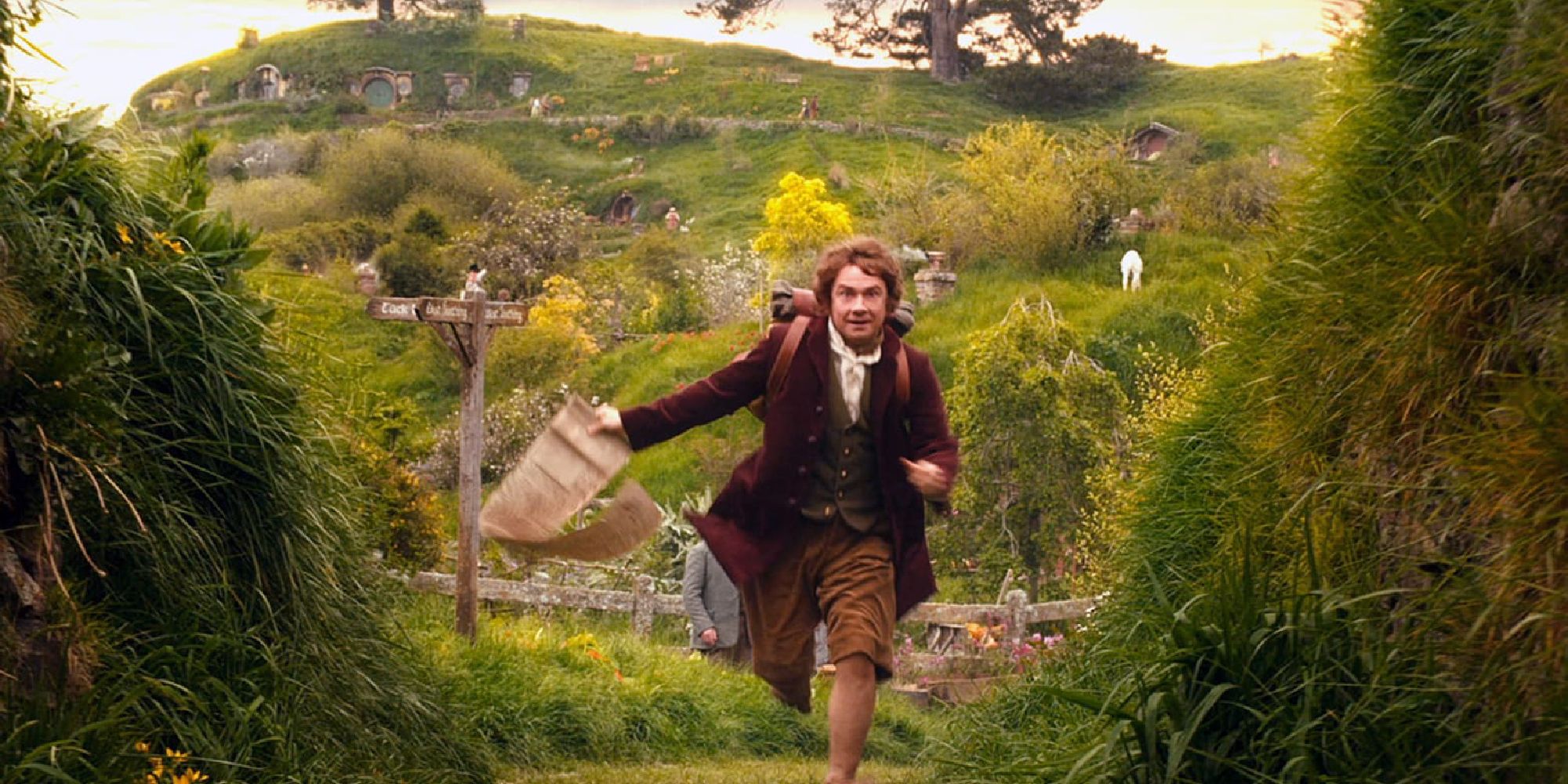Bilbo races through the shire with his contract in hand, trying to catch up to the dwarves to embark on their quest