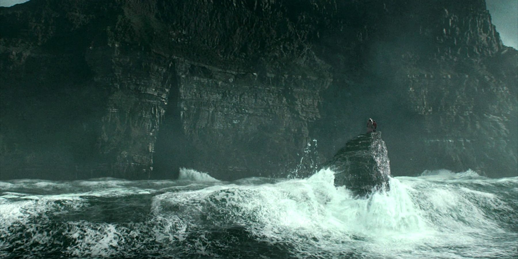 Harry Potter and Dumbledore prepare to explore a cave in the Half-Blood Prince