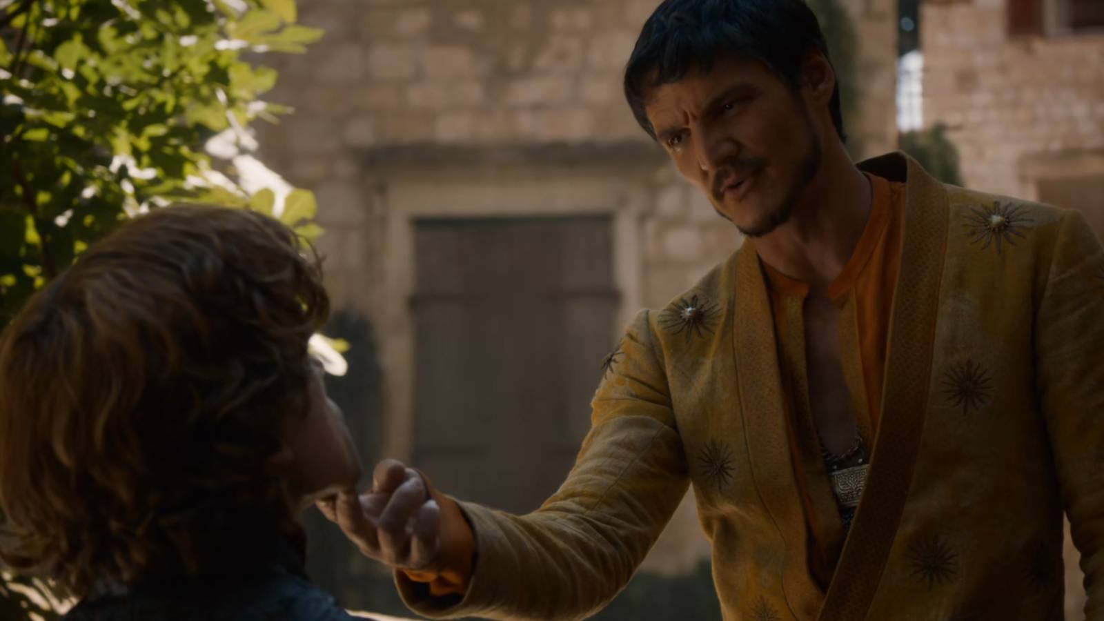 Oberyn Martell talking to Tyrion Lannister in Game of Thrones.