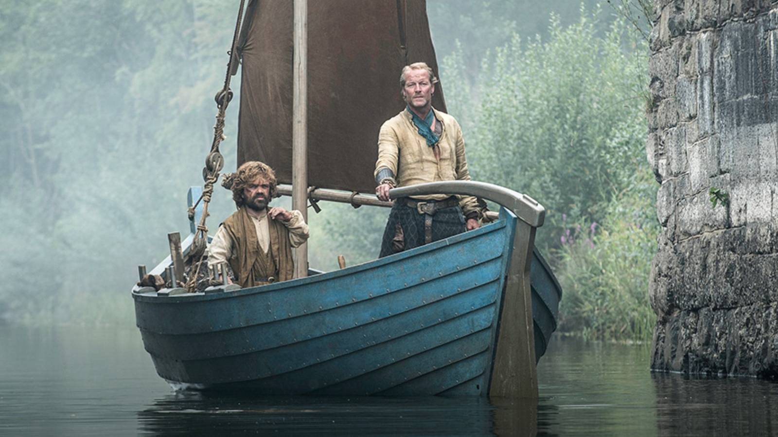 Tyrion Lannister and Ser Jorah sailing through the ruins of Valyria in Game of Thrones.
