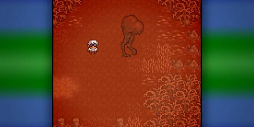 Young standing next to a tall, furry, bipedal creature in a reddish landscape. Image source: Nitro Rad YouTube.