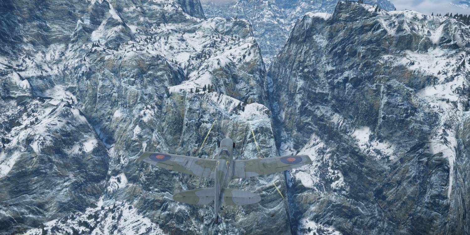 A plane flying over snowy mountains