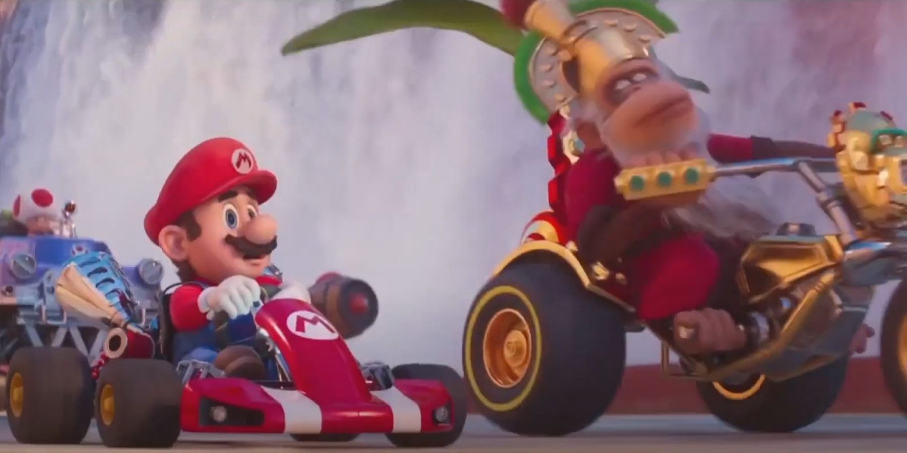 Mario in kart and Aztec Cranky Kong in Super Mario Bros. movie