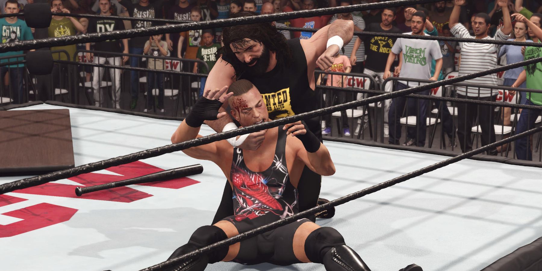 Cactus Jack attacking RVD's head