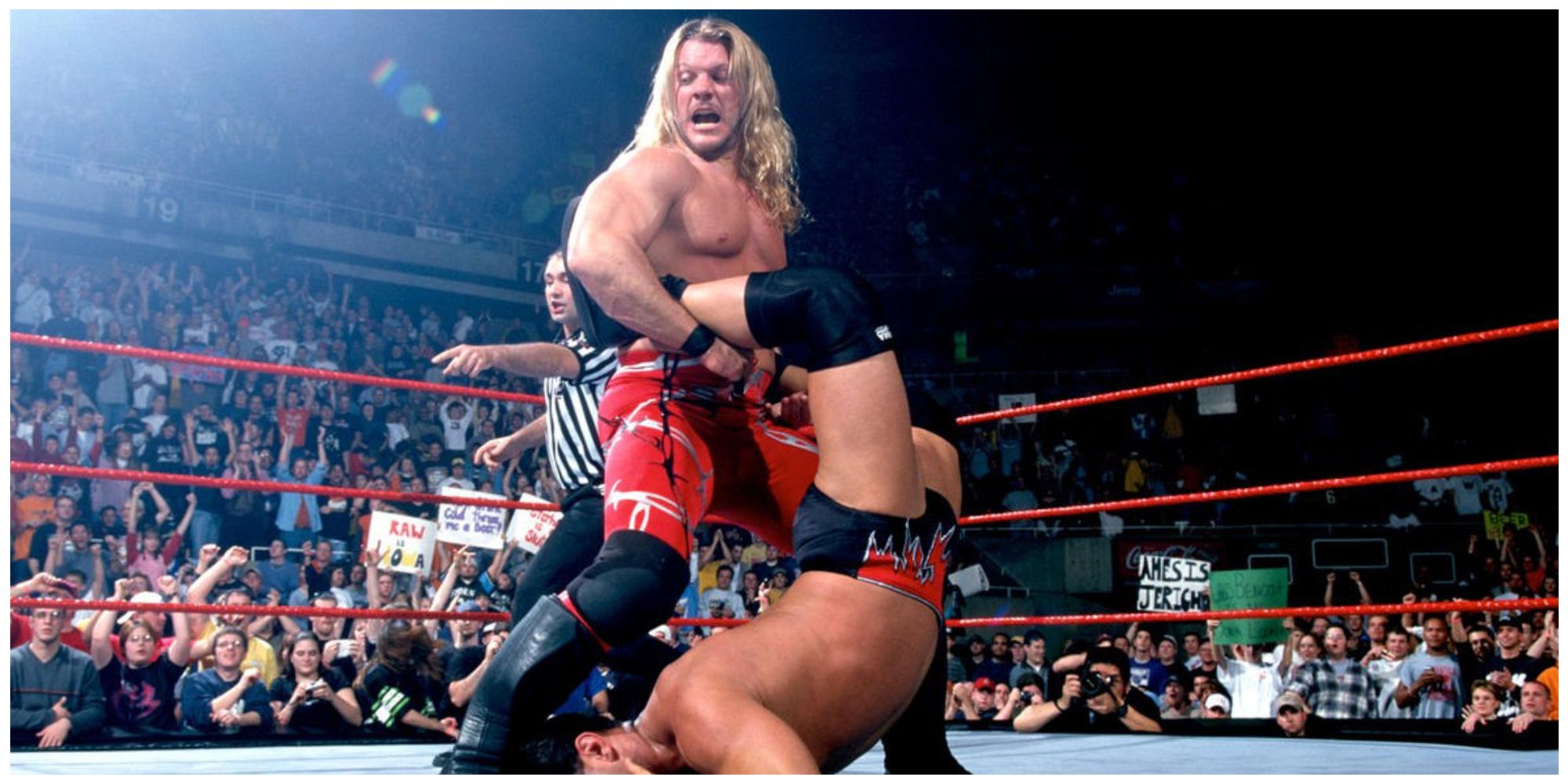 Chris Jericho using his signature move the Walls of Jericho on another wrestler in a WWE match