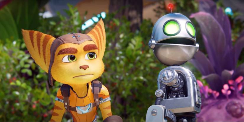 Ratchet and Clank side by side looking into the distance. There are bushes in the background and a purple plant.
