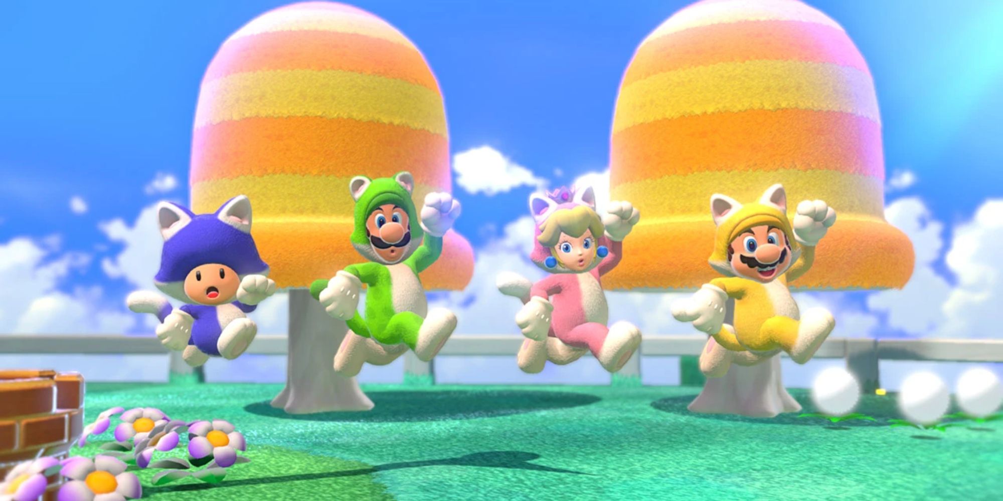 Toad, Luigi, Peach, and Mario jumping in cat costumes