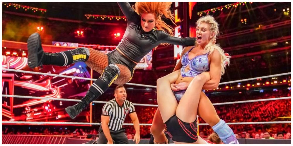 Becky Lynch vs. Charlotte Flair vs. Ronda Rousey