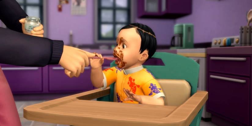 infant in high chair eating