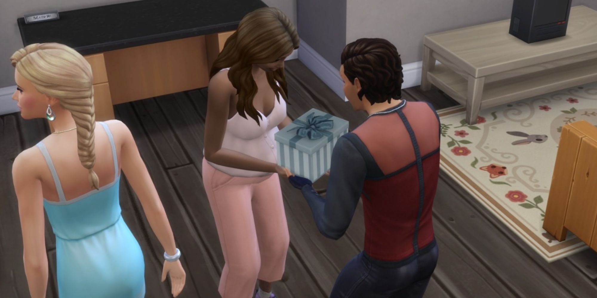 giving a gift to sim at baby shower
