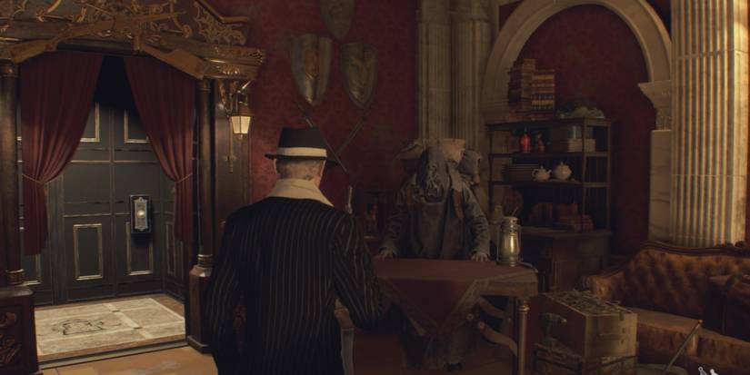 Leon faces the Merchant in Resident Evil 4 Remake