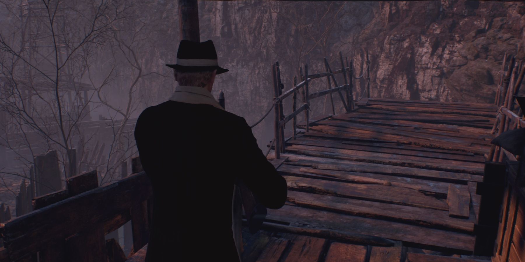 Leon walks toward the Fish Farm in Resident Evil 4 Remake