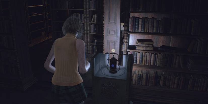 Ashley places the Lantern on a pedestal in Resident Evil 4 Remake