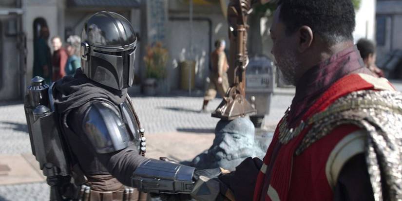 greef karga and the mandalorian shaking hands