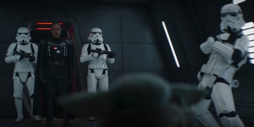 Grogu force choking stormtroopers with Moff Gideon in The Mandalorian