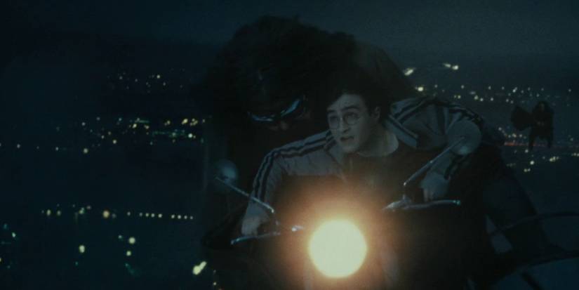 Hagrid-and-Harry-Potter-on-flying-motorcycle-being-chased-by-Death-Eater