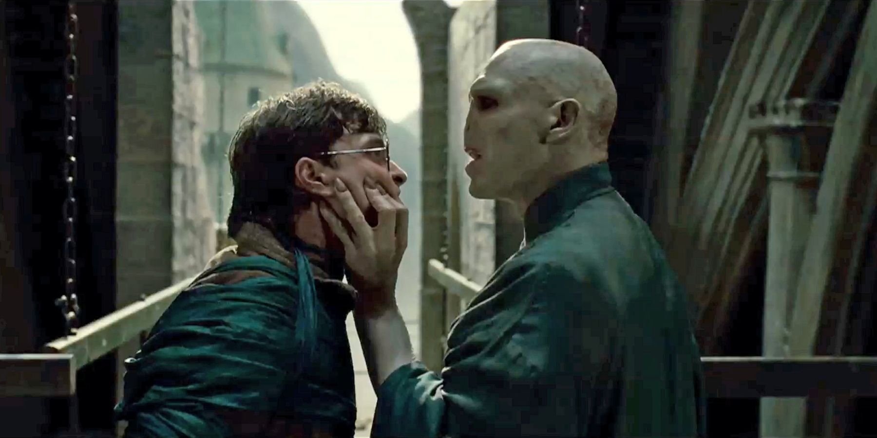 Voldemort touching Harry Potter's face