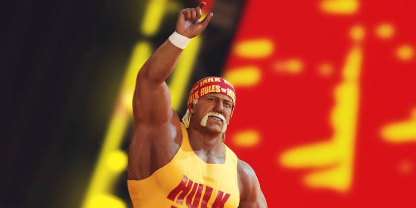 Hulk Hogan in a yellow tank top and red bandana raising his hand in the air in WWE2K23