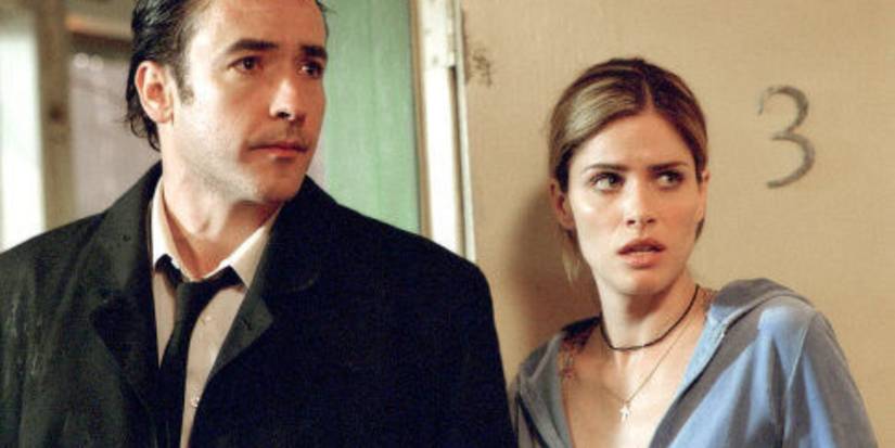 John Cusack and Amanda Peet in Identity