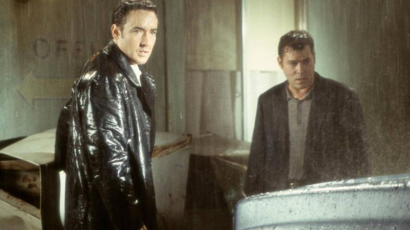 John Cusack and Ray Liotta in the rain in Identity