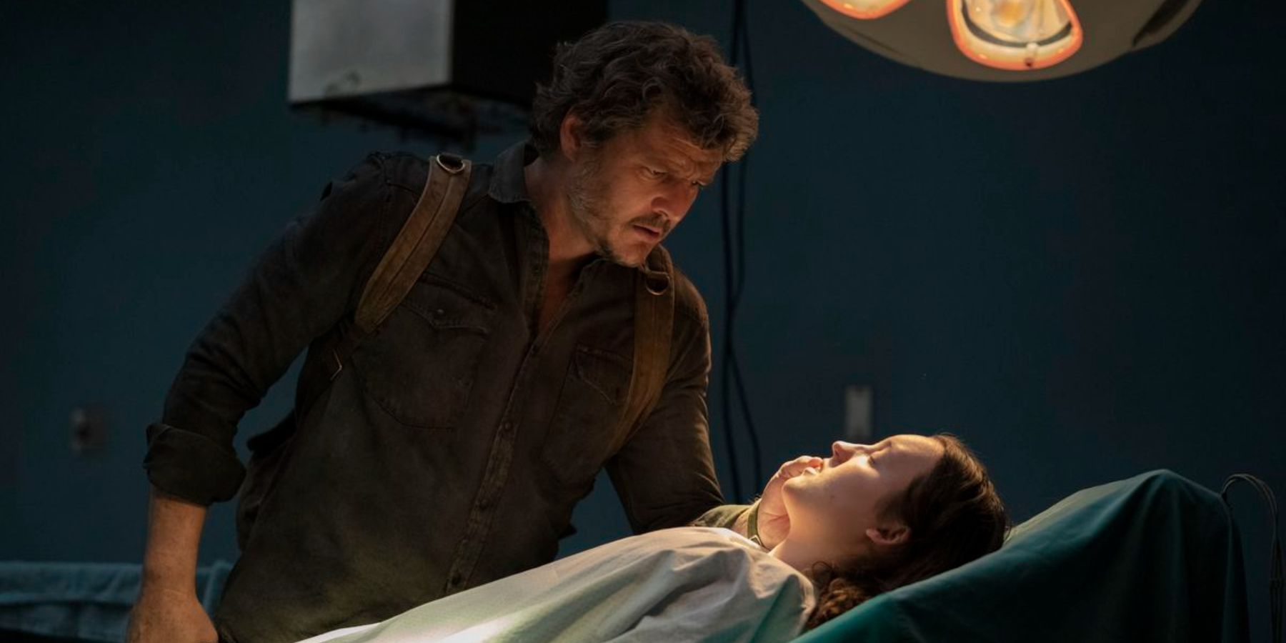 Joel looking at Ellie in the operating room in The Last of Us finale.