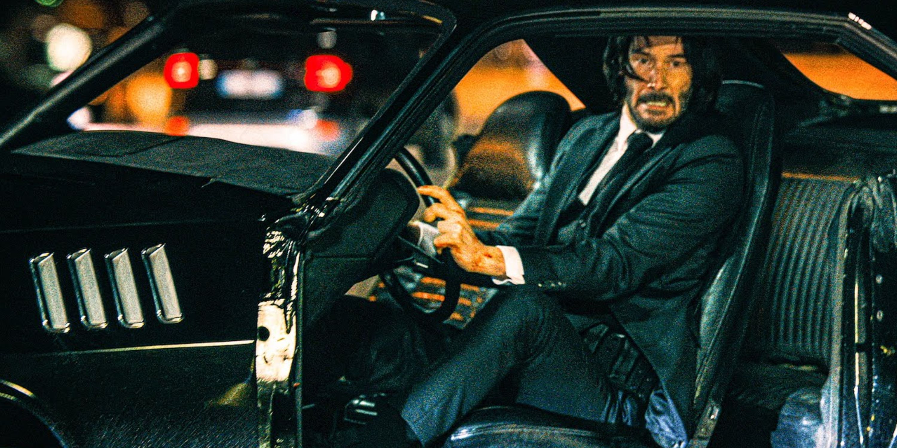 john wick driving a muscle car with no doors