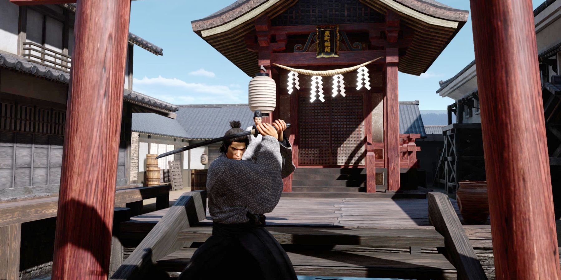 Like a Dragon Ryoma posing outside a Shinto Temple